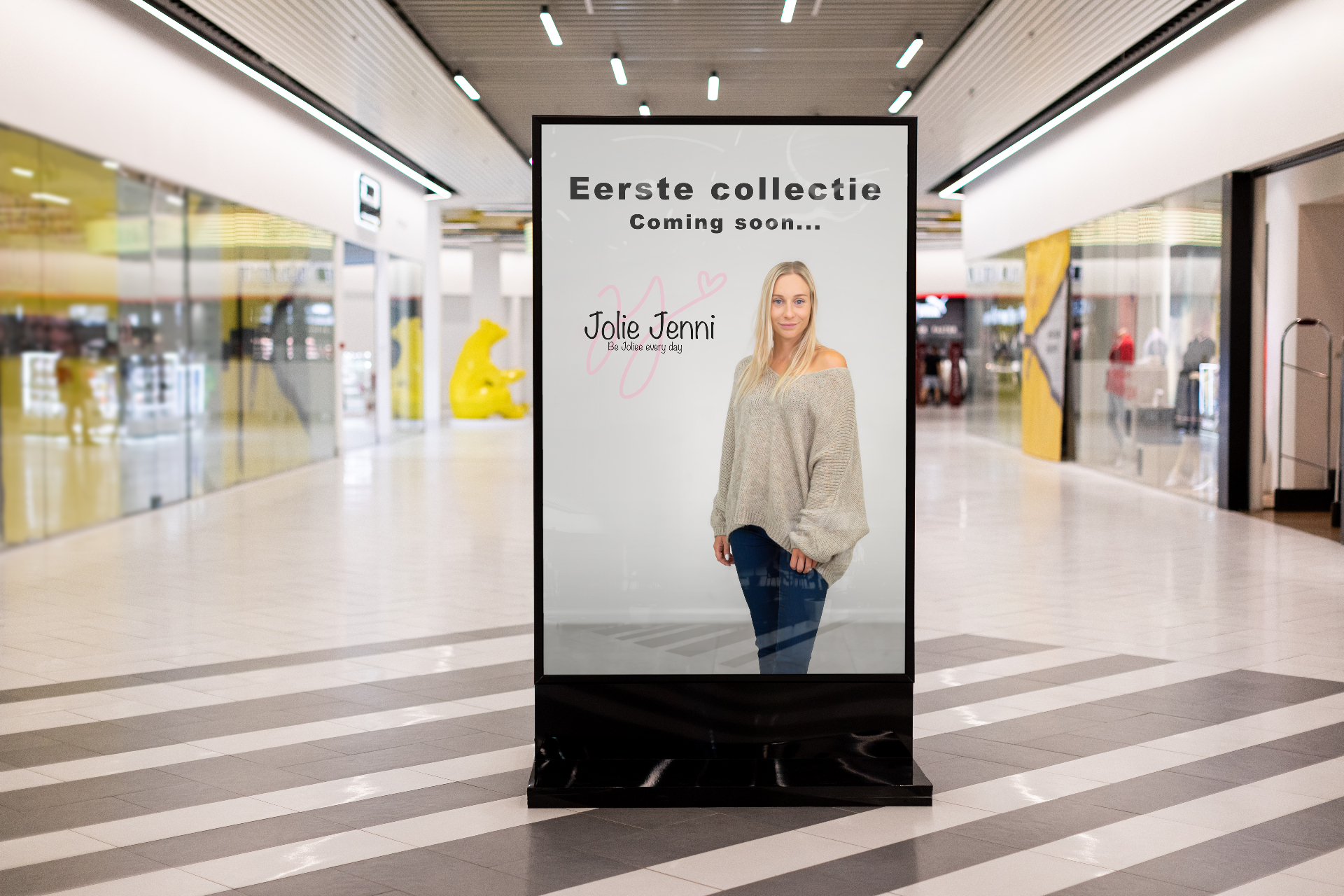 Jolie Jenni billboard in shopping center — Eerste collectie coming soon